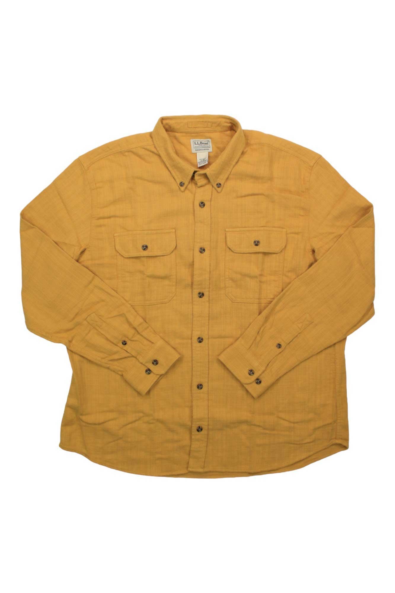 The L.L.Bean Mens 1912 Field Flannel Slightly Fitted Shirt is a long-sleeve, button-up mustard yellow men’s shirt with two chest pockets and buttoned cuffs, shown laid flat on a white background.