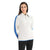 A woman stands facing the camera against a white background, wearing the Icebreaker Womens Lodge LS Half Zip Sweater in cream with blue sleeve stripes, her hands behind her back.