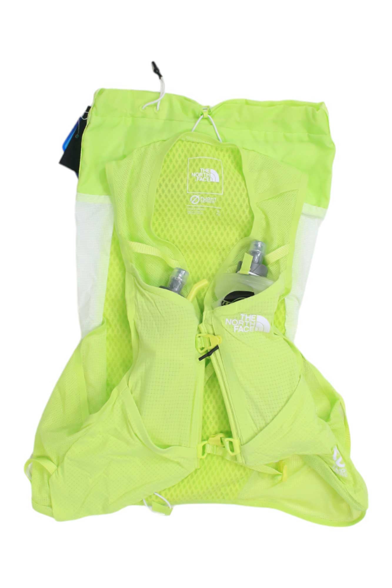 The neon yellow Flight Training Pack 12 by The North Face features mesh pockets, holds two water bottles, and comes with a matching drawstring bag. The front sports the logo, making it a standout hydration backpack for runs.