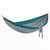A teal and gray Eagles Nest Outfitters SingleNest Hammock hangs from black straps with metal carabiners. A small attached pouch with a visible logo dangles at the side—ideal for your next outdoor adventure.