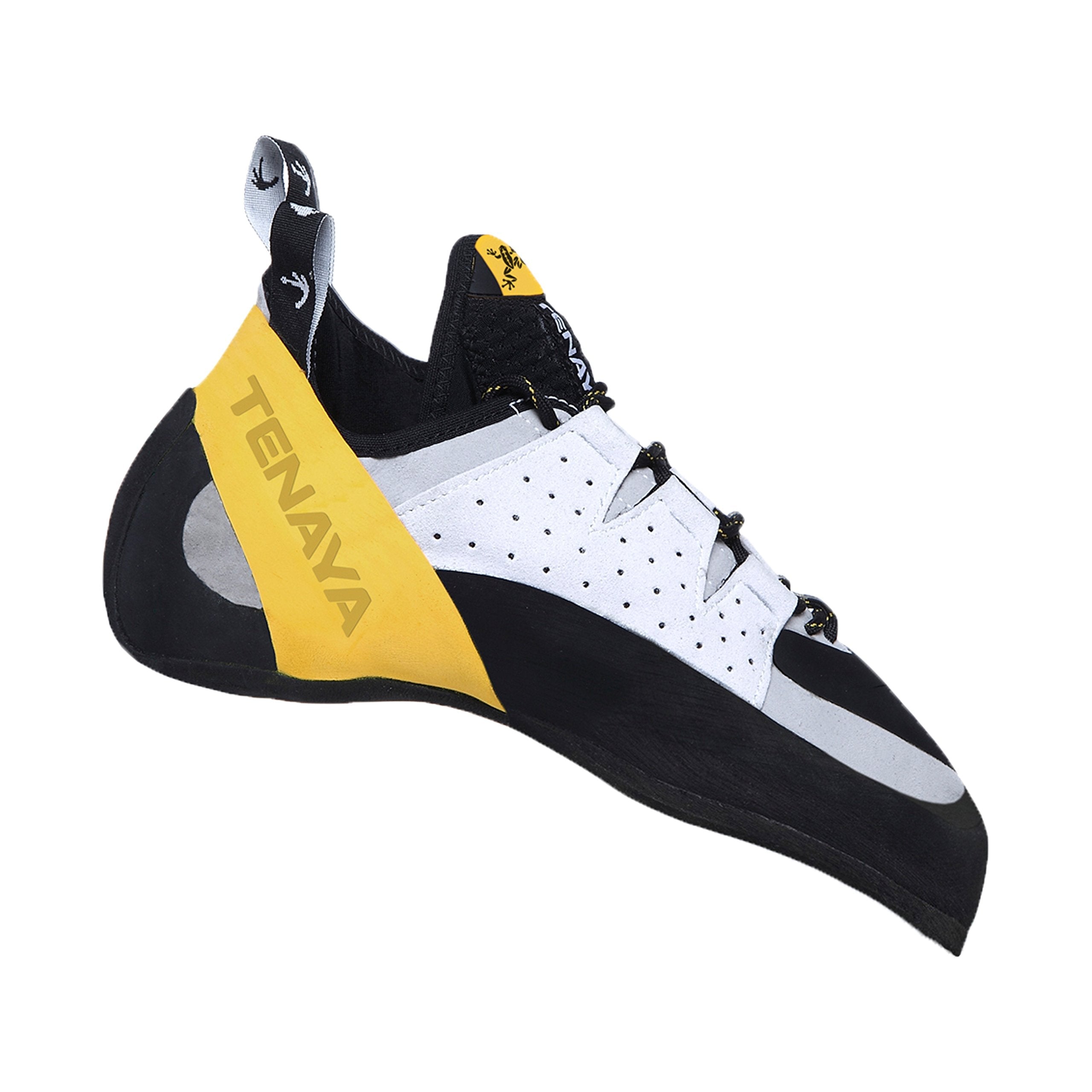 The Tenaya Tarifa Climbing Shoe in white, black, and yellow features “TENAYA” on the side, black laces, perforated details, a hook-and-loop closure system, and a Vibram XS Grip rubber outsole, displayed against a white background.