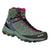 The Salewa Women's Alp Trainer 2 Mid GTX Waterproof Hiking Boots feature a green and black design with maroon laces, mesh panels, Vibram Alpine sole, metal eyelets, reinforced stitching, and the Salewa logo for durable outdoor performance.