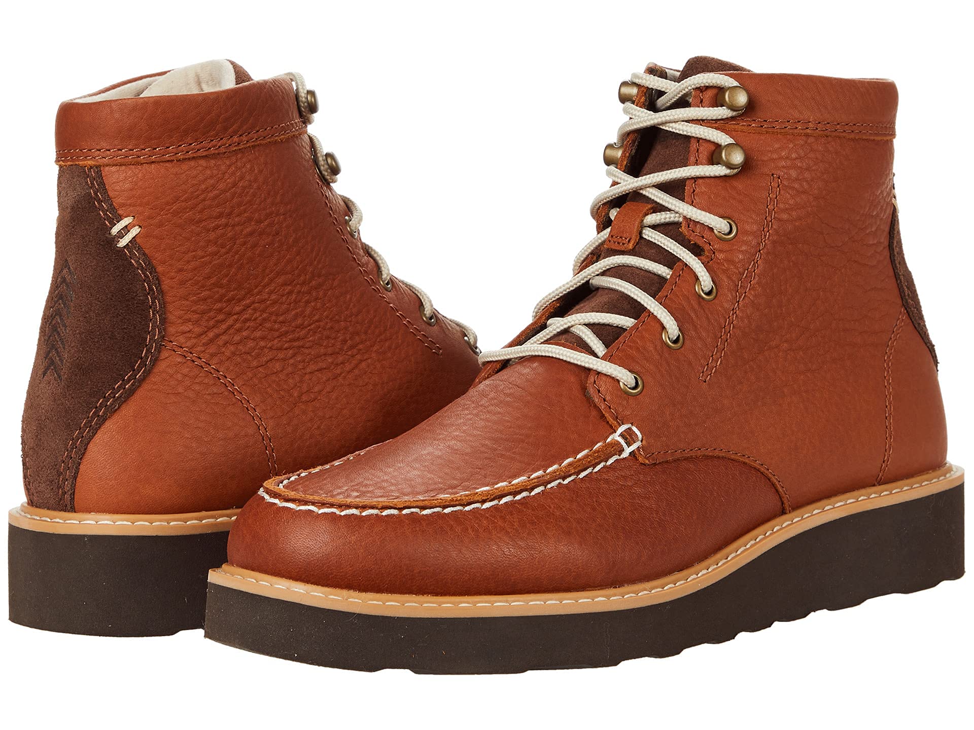 The Kodiak Scotia Brown Mocc Vamp Wedge Shoes feature brown leather, white stitching, light laces, dark soles, and suede heel detailing—combining rugged style and comfort, displayed from front and back angles.