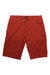 The Black Diamond Mens Credo Short is a pair of red, knee-length climbing shorts made from organic cotton with front pockets, belt loops, button and zipper closure, and an adjustable waistbelt, shown against a white background.