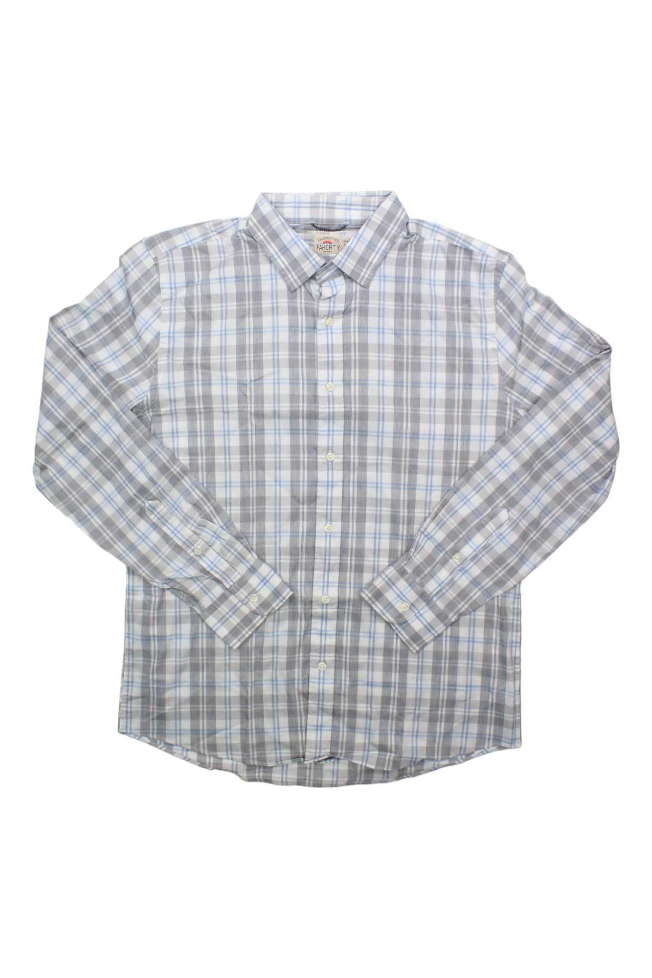 A Faherty Men's The Movement Shirt, long-sleeve button-up with light blue, gray, and white plaid, spread collar, and cuffed sleeves—made from moisture-wicking fabric—laid flat on a white background.