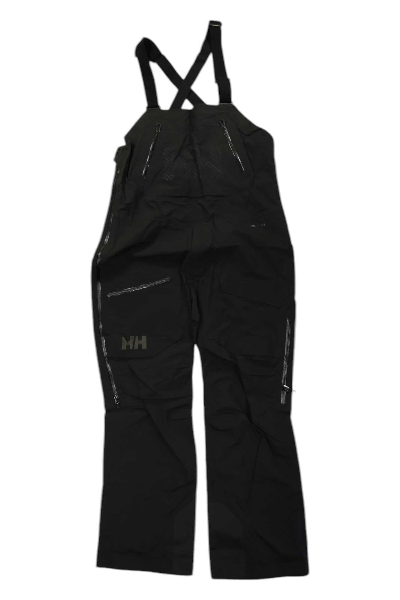 The Helly Hansen Mens Ridge Infinity Bib Shell Pant in black, featuring adjustable shoulder straps, zippered pockets, and the HH logo on the left thigh; waterproof for superior style and protection.