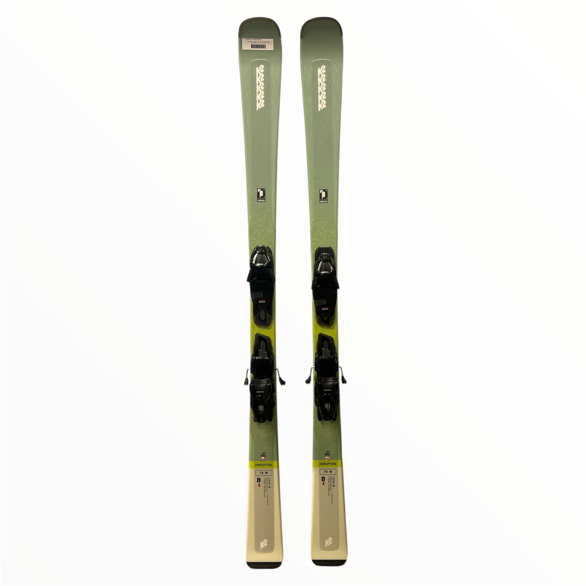 A pair of K2 Disruption 76 W Alpine Skis with ERP 10 Quikclik bindings is shown upright, featuring green and gray colors, displayed side by side on a white background.