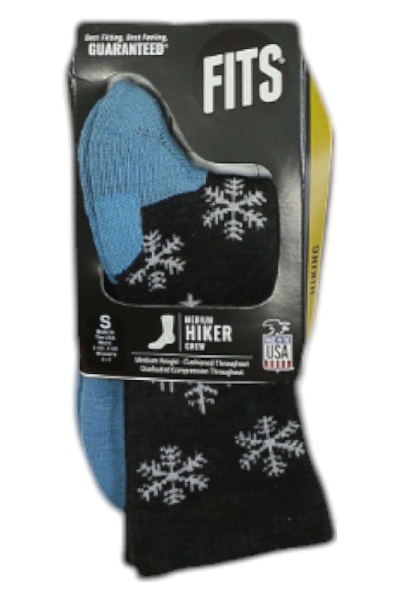 A package of FITS Mens Medium Hiker Crew Aspen Socks, mostly black with white snowflake patterns and blue heels and toes. Features are highlighted on the packaging, along with a USA-made label. Size: medium.