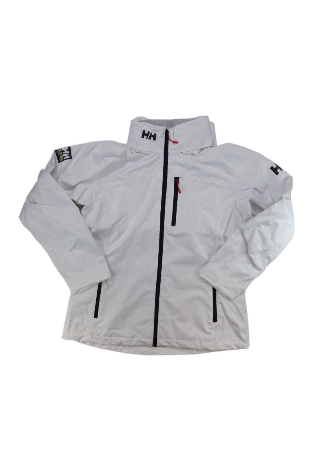 The Helly Hansen Womens Crew Hooded Jacket is a white waterproof jacket with a front zipper, black accents, the HH logo on the chest and sleeve, long sleeves, high collar, and an added hood for extra protection.