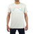 A person wears the Moosejaw Men's Tiger Roll SS Tee, a light vintage-washed shirt with a mountain, sun, and colorful lines graphic above "Moosejaw," fitting comfortably as they stand with arms relaxed at their sides.