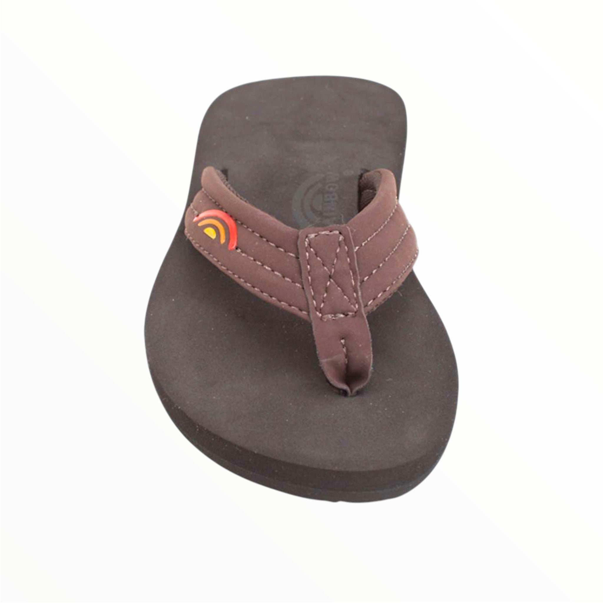 A Rainbow Kids Grombows Sandal with a thick black sole and brown neoprene strap, featuring a small rainbow logo on the left strap, is displayed against a white background.