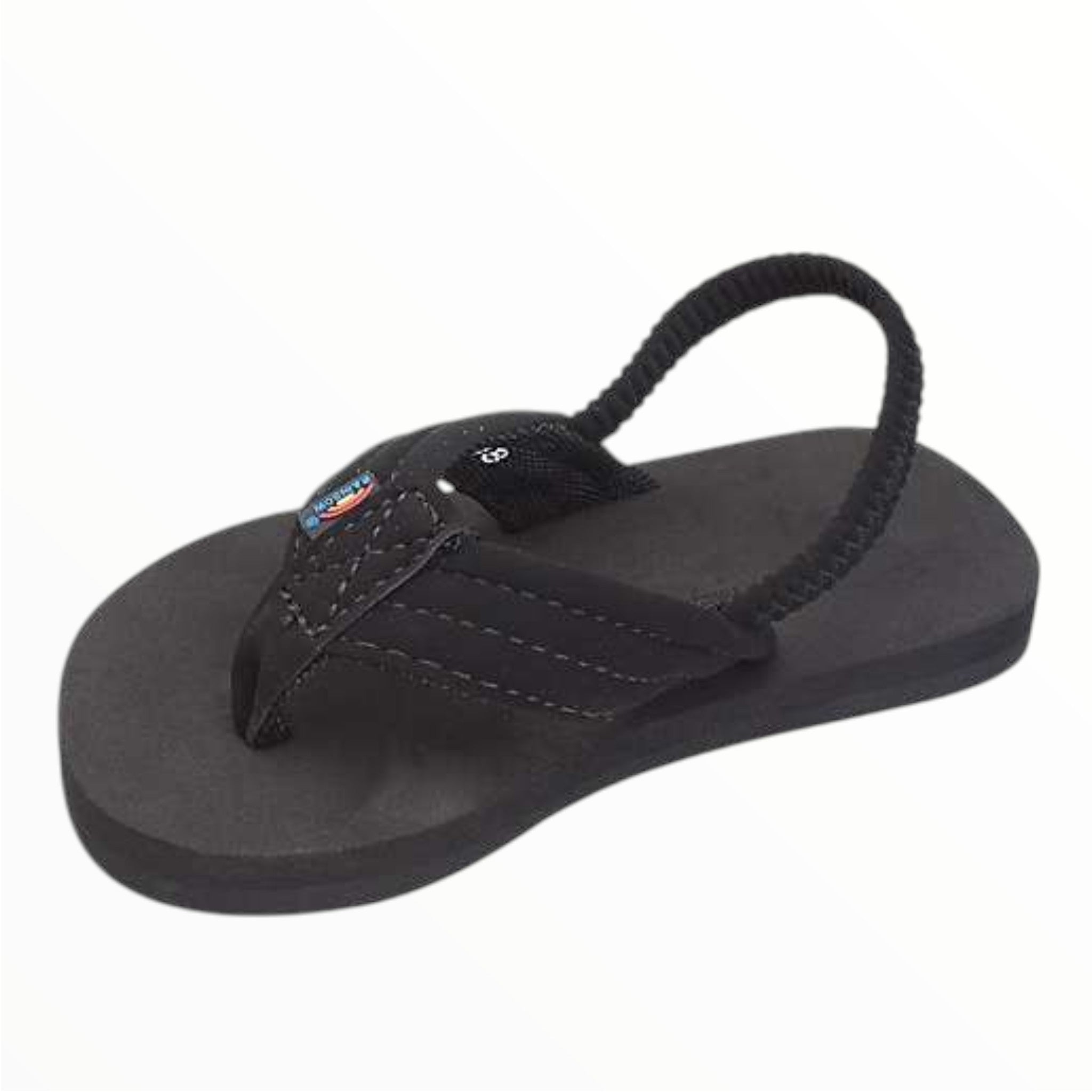 The Rainbow Kids Grombows Sandal is a stylish black sandal for young children, featuring a fabric thong strap with logo label, an elastic neoprene back strap, and a black sole—perfect for comfort and everyday wear.