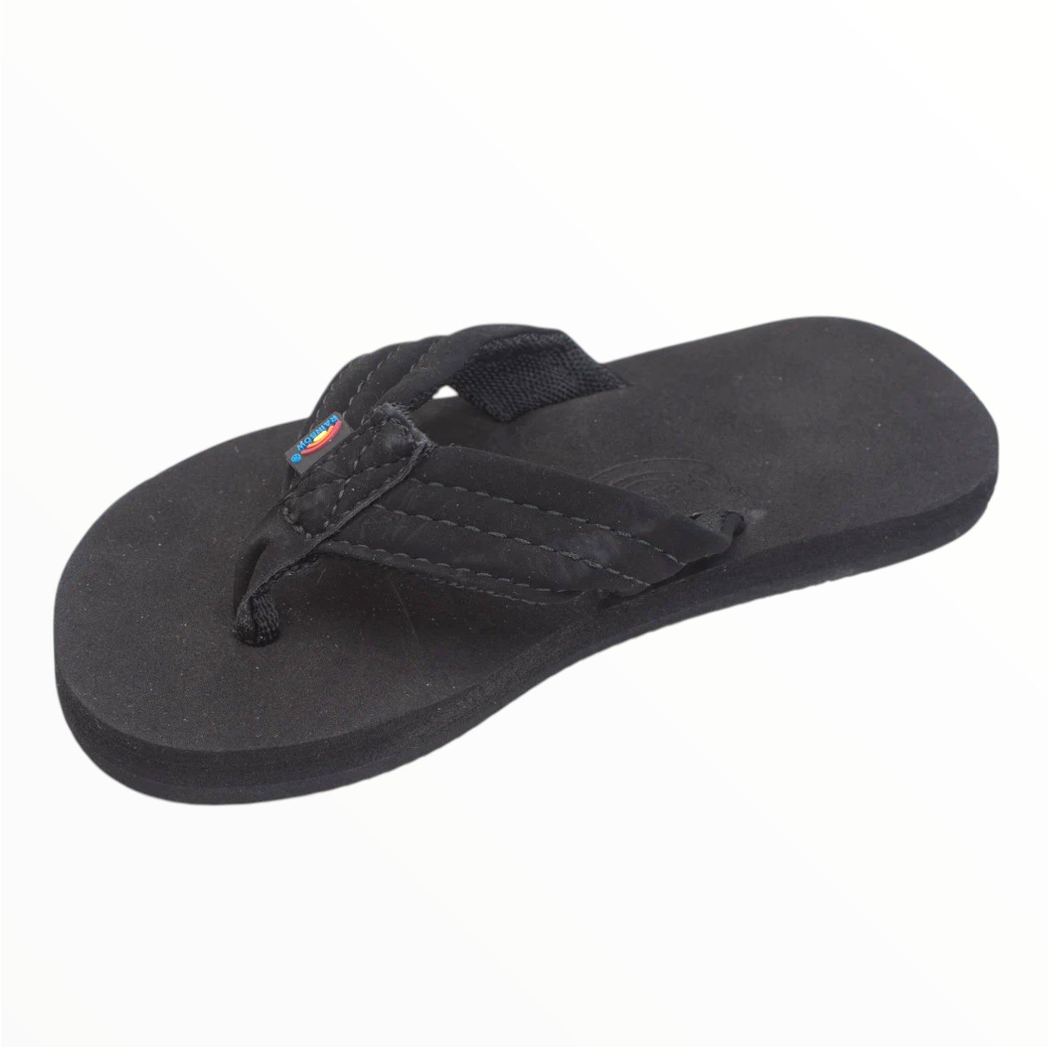 A single Rainbow Kids Grombows Sandal in black with a fabric thong strap and logo, shown on a white background.