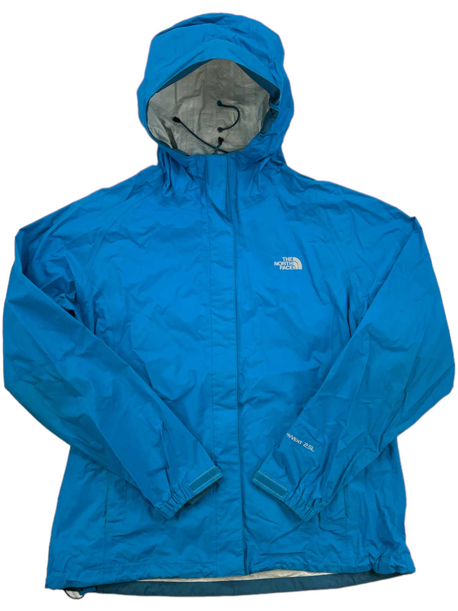 A vibrant blue Columbia Womens Venture Jacket made from recycled materials, featuring a hood, front zipper, and Columbia logo on the chest. The waterproof, breathable jacket is laid flat on a white surface.