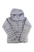 The Haglofs Womens Roc Down Hoodie in light gray features a front zipper, horizontal quilting, side pockets, an attached hood, and a fluorocarbon-free Pertex shell. Shown laid flat on a white background.