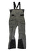 The Helly Hansen Men's Sogn Bib Shell Pant in gray and black features suspenders, multiple pockets, adjustable straps, and reinforced knees and ankles for skiing. A small HH logo is on the left thigh.