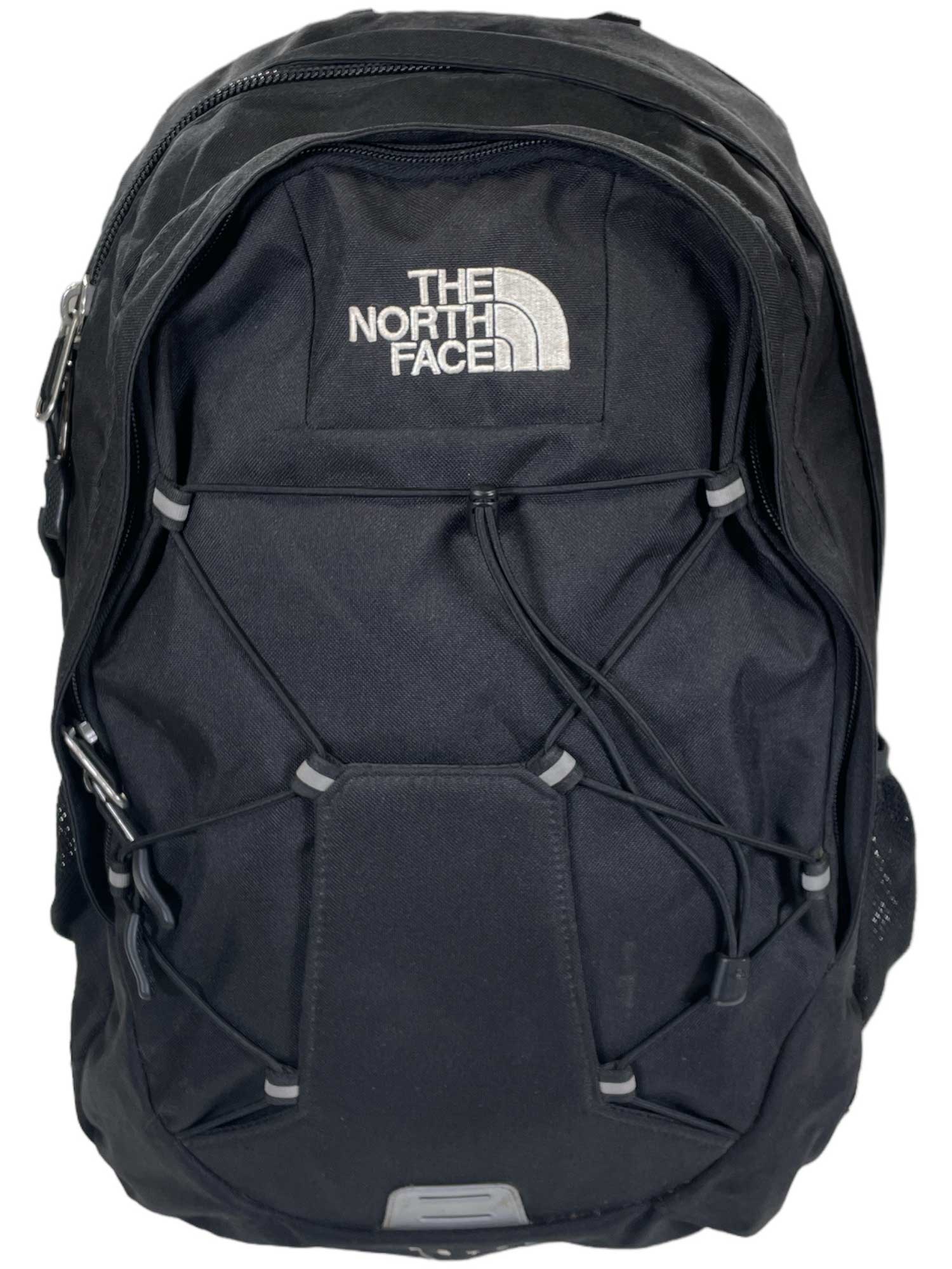 Jester daypack backpack in dark black with front pocket and The North Face logo