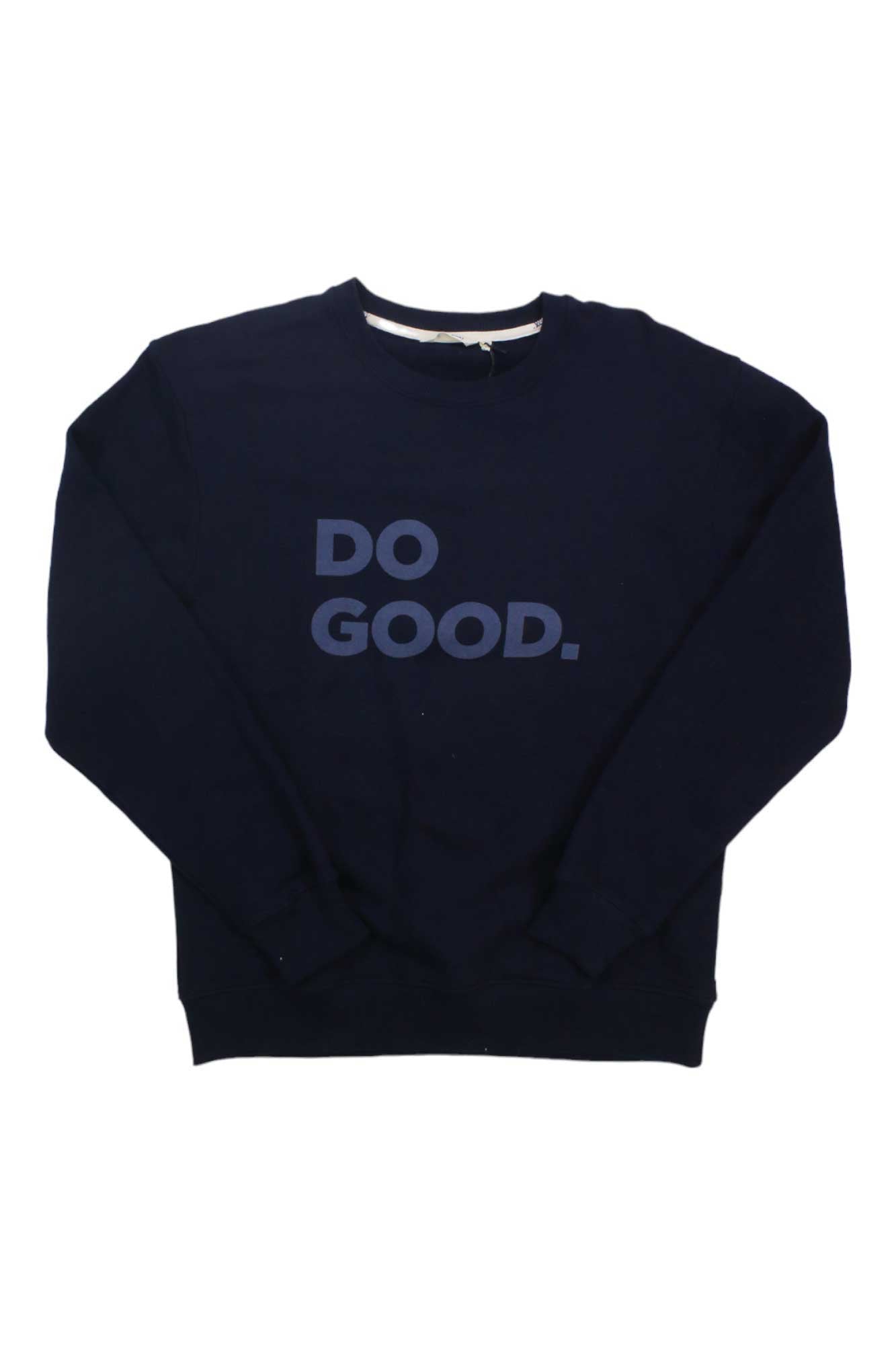 The Cotopaxi Women's Do Good Crew Sweatshirt is a navy blue sweater made from an organic cotton blend, featuring "DO GOOD." in bold uppercase letters on the front, shown laid flat on a white background.