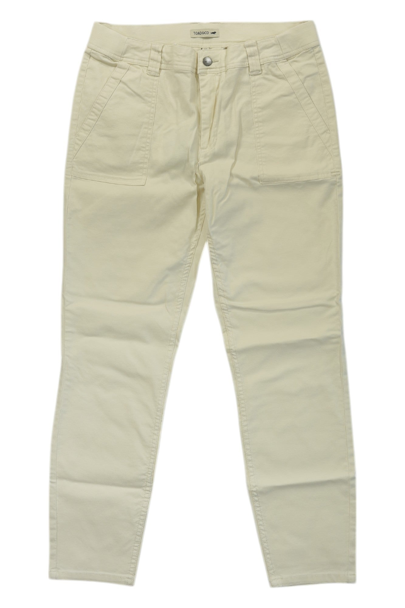 The Toad & Co Womens Earthworks Ankle Pant is a pair of off-white durable hiking pants with front pockets, belt loops, and a button closure, shown laid flat on a white background.