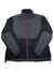 The Denali Jacket is a women's black and dark gray fleece by The North Face, featuring a full front zipper, zippered chest pocket, red left chest logo, adjustable drawcords at hem and sleeves, and made from recycled fleece.