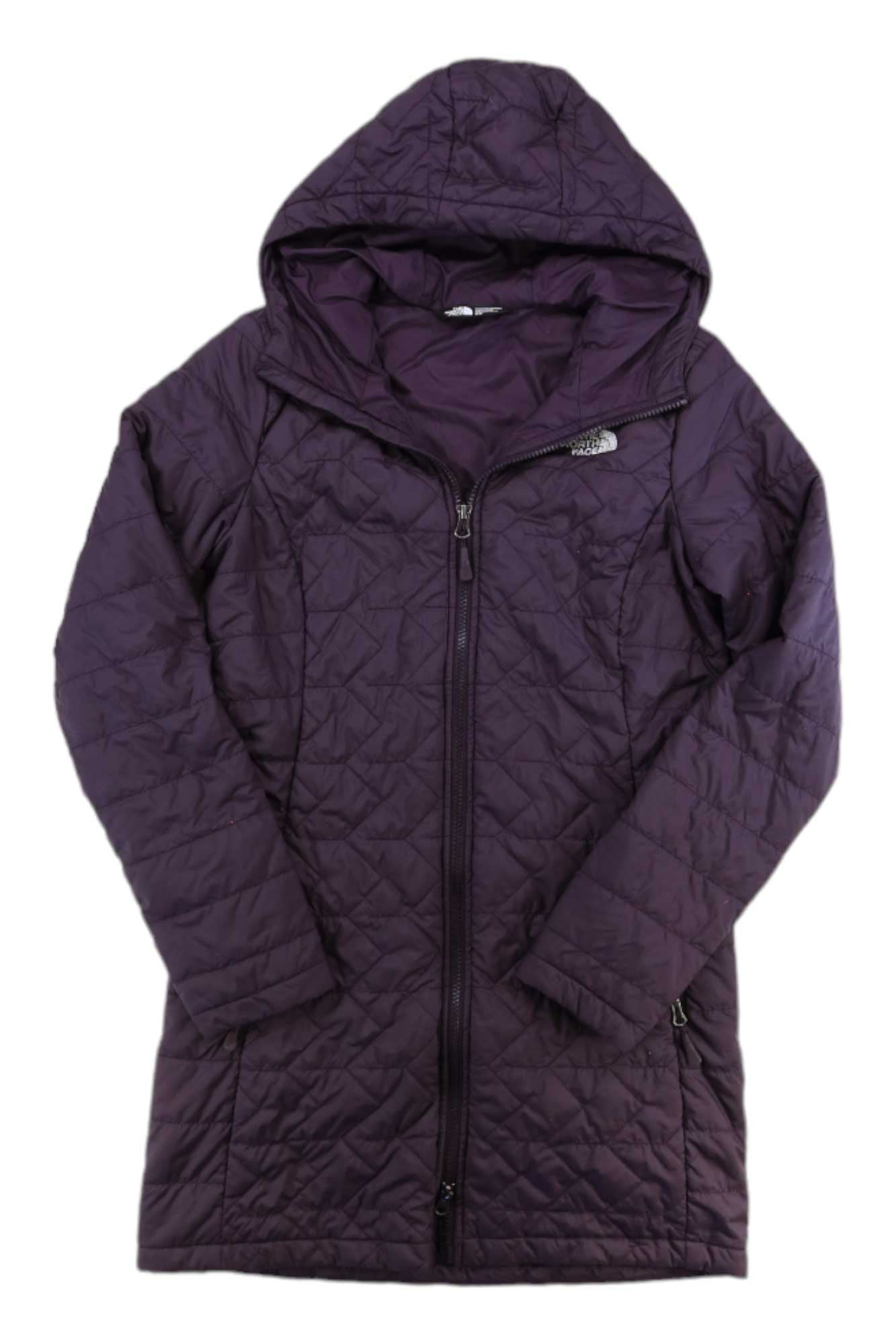 The North Face Womens Tamburello Parka, a long, dark purple quilted coat with Heatseeker insulation and front zipper, is shown laid flat on a white background.