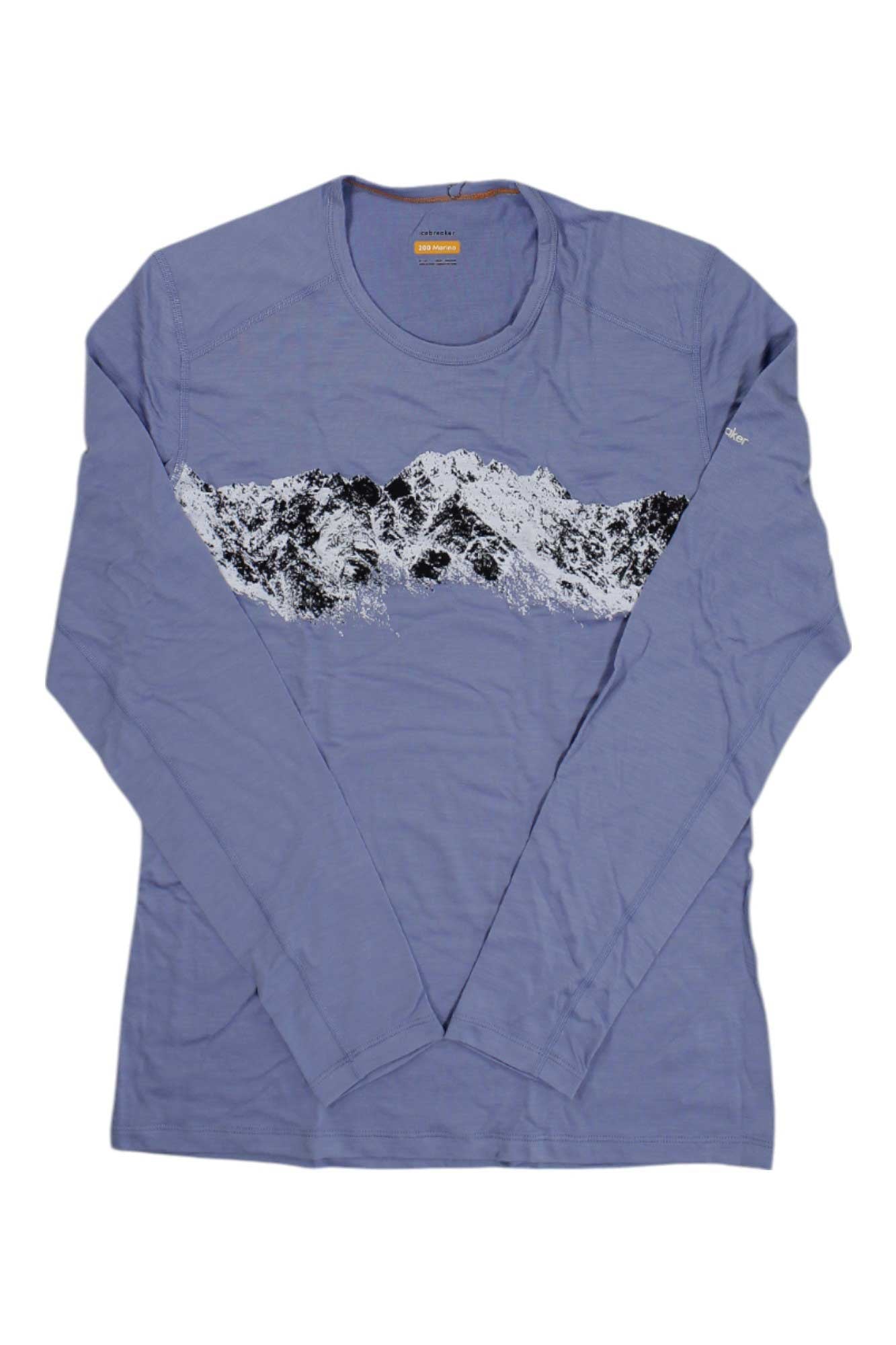 The Icebreaker Mens Merino 200 Oasis Remarkables LS Crewe is a long-sleeve lavender moisture-wicking shirt with a black and white mountain range graphic on the chest, shown on a white background.