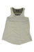 The Sherpa Womens Asha Tank is a sleeveless, light beige top with a round neckline, made from soft drirelease fabric for moisture wicking. Shown flat on white, its inside back collar shows a visible clothing label.