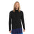 A smiling person with long blond hair wears the Icebreaker Mens ZoneKnit LS Zip Jacket in black and blue shorts, standing against a plain white background.