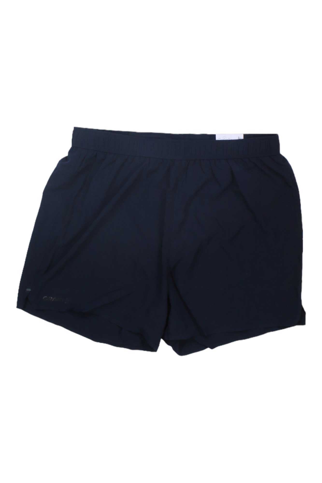 The Craft Sportswear Men's ADV Essence 5 Inch Stretch Short in plain black features an elastic waistband and moisture-wicking fabric, shown laid flat on a white background.