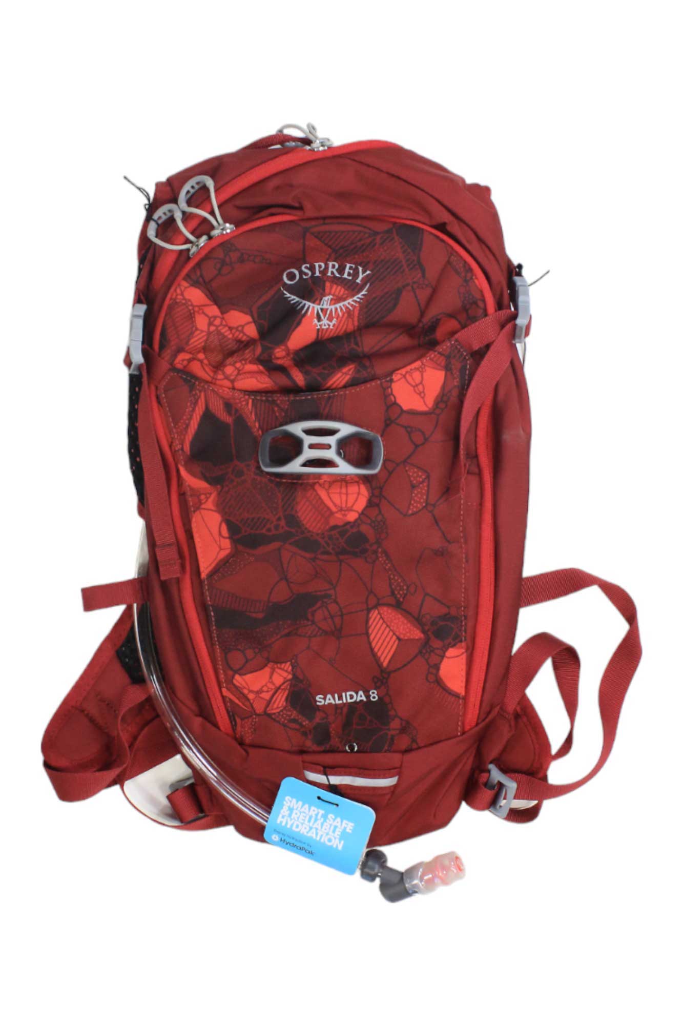 The Osprey Salida 8 Hydration Pack features a red floral design, multiple compartments, adjustable straps, and a hydration tube with a blue tag—ideal for mountain biking.