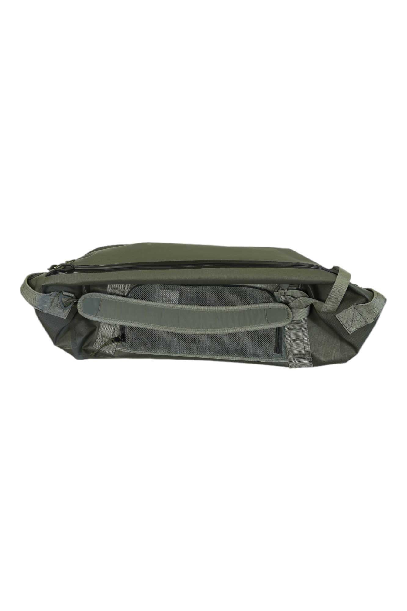 Mystery Ranch waterproof duffel bag, green with open top and interior pocket panel