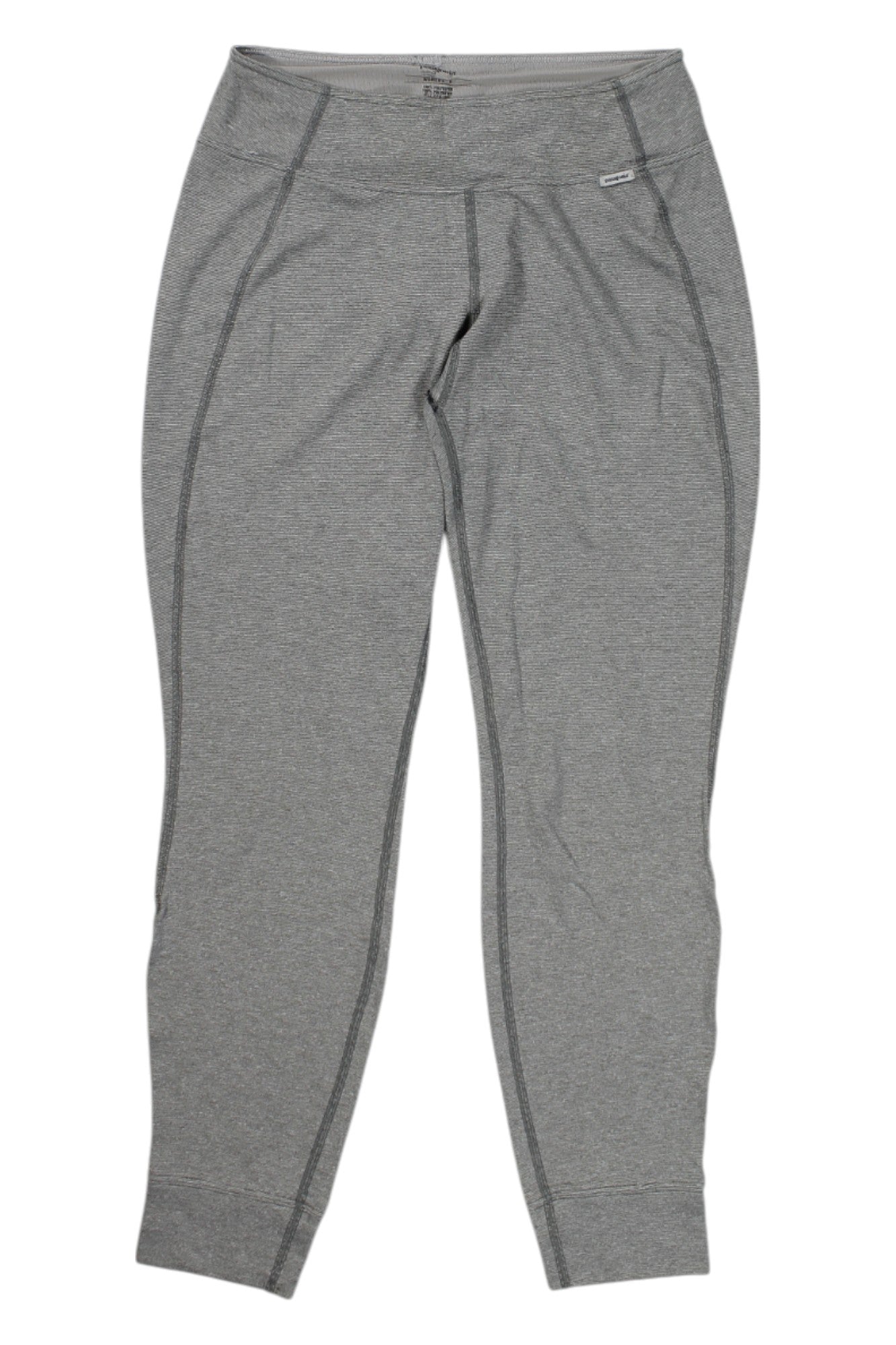 Patagonia Womens Capilene 3 Midweight Bottoms in gray, laid flat on a white background, feature a wide waistband and seam detailing—perfect as a moisture-wicking baselayer for active wear.