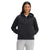 A woman faces forward with her hands in the pockets, wearing The North Face Womens Longs Peak Quilted Full Zip Hoodie in black and light gray pants, set against a plain white background.
