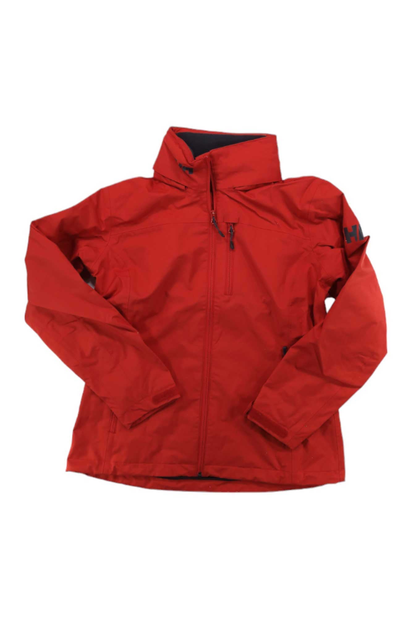 A red Helly Hansen Womens Crew Hooded Jacket with long sleeves, high collar, chest zipper pocket, and HH logo on the left sleeve is shown waterproof and laid flat on a white background.