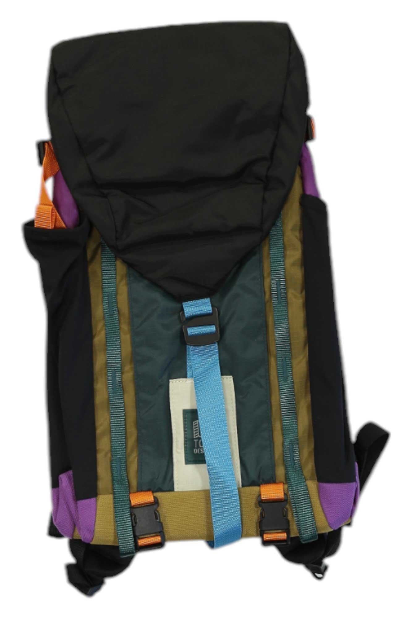 The Topo Designs Mountain 16L Pack is a multi-colored hiking backpack featuring a black top flap, green and olive body, purple accents, blue straps, orange buckles, and a built-in laptop sleeve, shown on a white background.