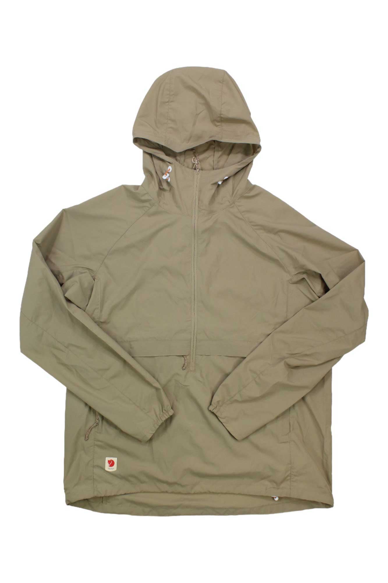 The Fjallraven Women's High Coast Lite Anorak in khaki, made from recycled polyester, features a hood, half-zip front, long sleeves, and a small patch logo near the left hem. It is shown flat on a white background.