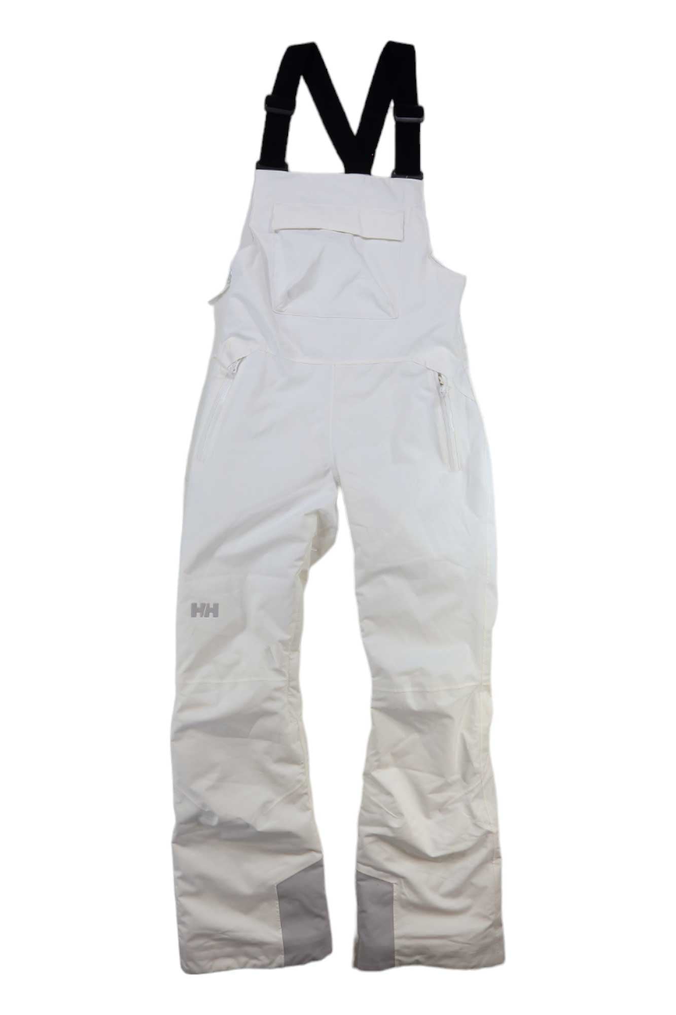 The Helly Hansen Womens Legendary Insulated Bib Pant, shown in white with black adjustable straps, features side and chest pockets. Laid flat on a white background, these insulated snow pants are ideal for staying warm on the slopes.