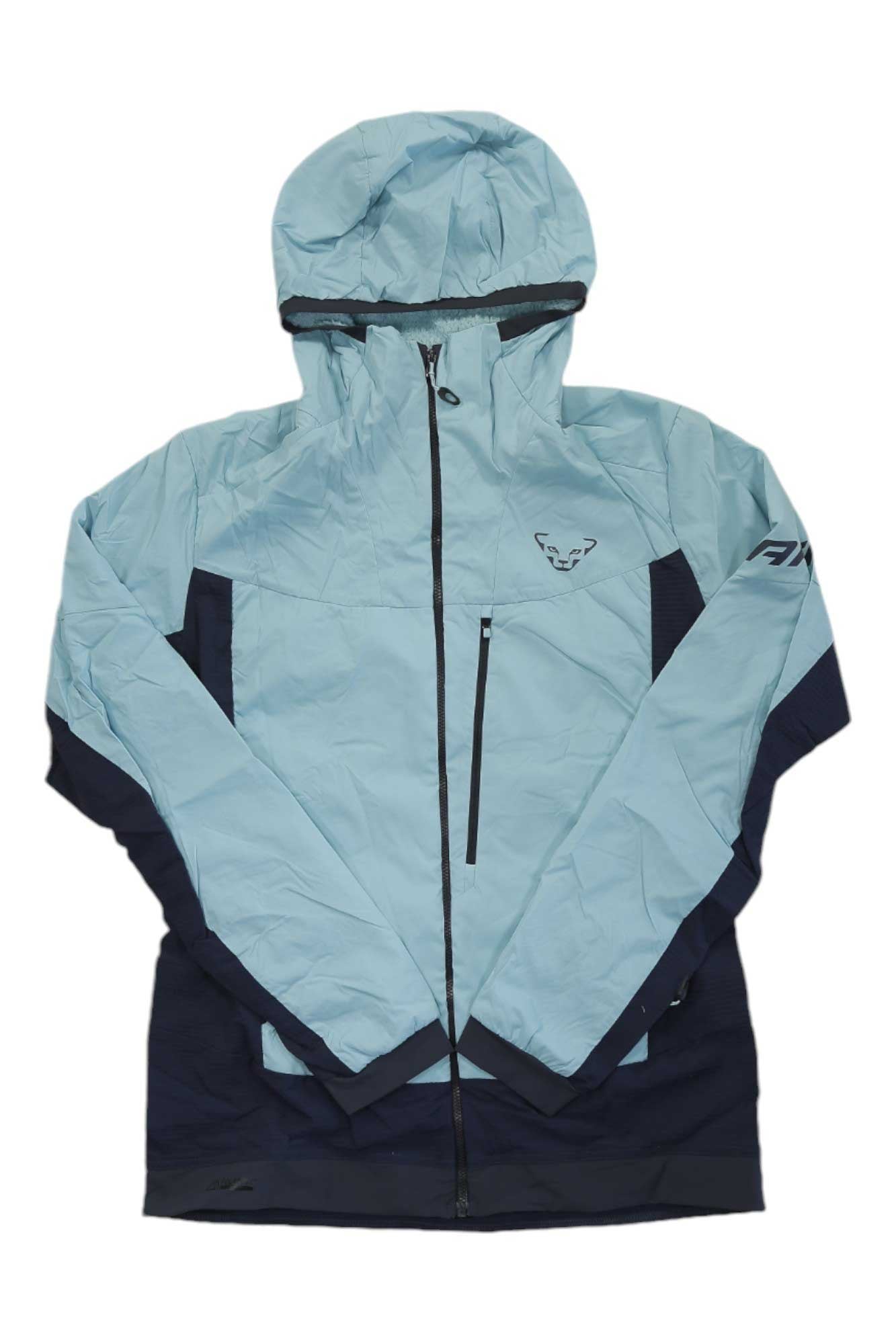 The Dynafit Women's Free Alpha Direct Jacket in light blue and navy features Polartec Alpha Direct insulation, a front zipper, chest pocket, and an embroidered logo on the left chest, shown laid flat on a white background.