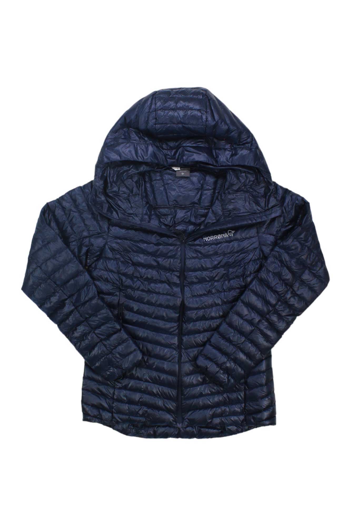 The Norrona Womens Trollveggen Superlight Down850 Hoodie is a lightweight, dark blue women's down jacket with alpine insulation, hood, front zipper, horizontal quilting, and a left chest logo, shown flat on a white background.