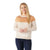 A smiling woman with long blonde hair wears the Smartwool Womens Edgewood Colorblock Crew Sweater and dark jeans, standing against a plain white background.