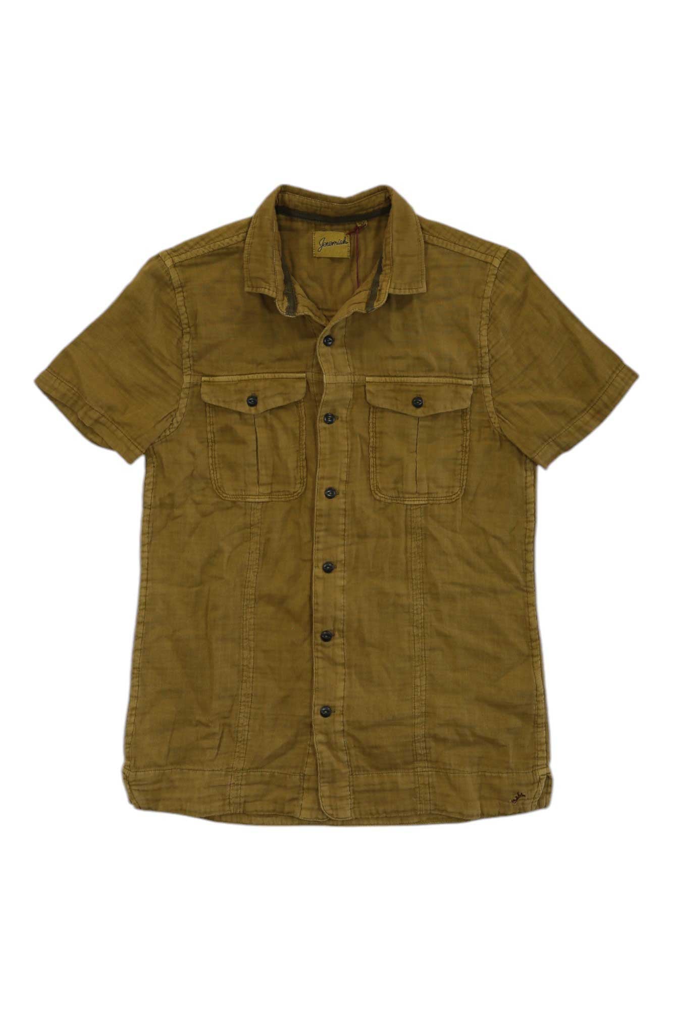 The Jeremiah Mens Komo Pigment Double Cloth Top is an olive-green cotton shirt with short sleeves, a button-up front, two chest pockets, and a collar, shown on a white background.