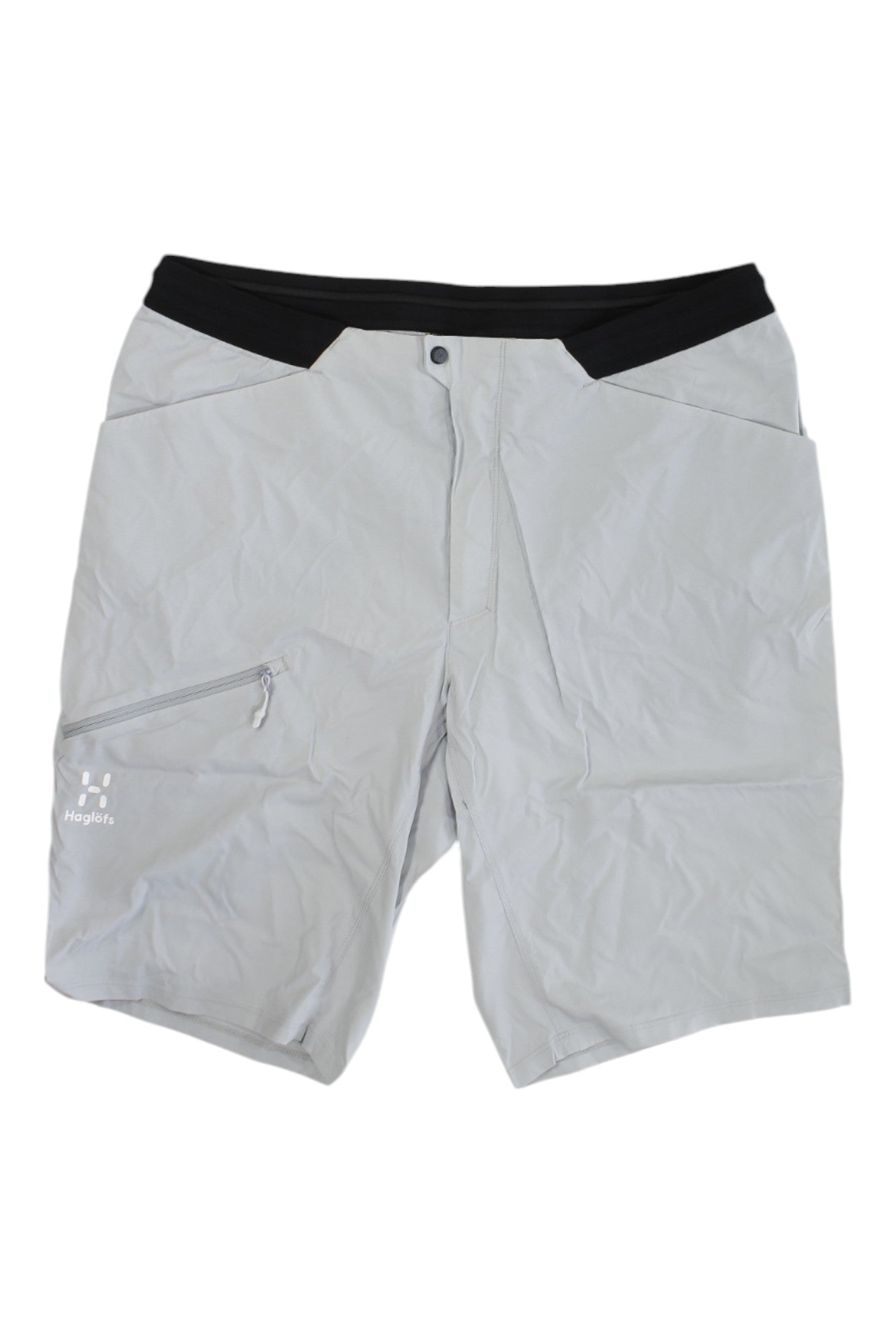 The Haglofs Mens L.I.M Fuse Short features light grey quick-drying fabric, a black waistband, zippered left thigh pocket, right pocket, button closure, and subtle logo—lightweight and ideal for your next outdoor adventure.