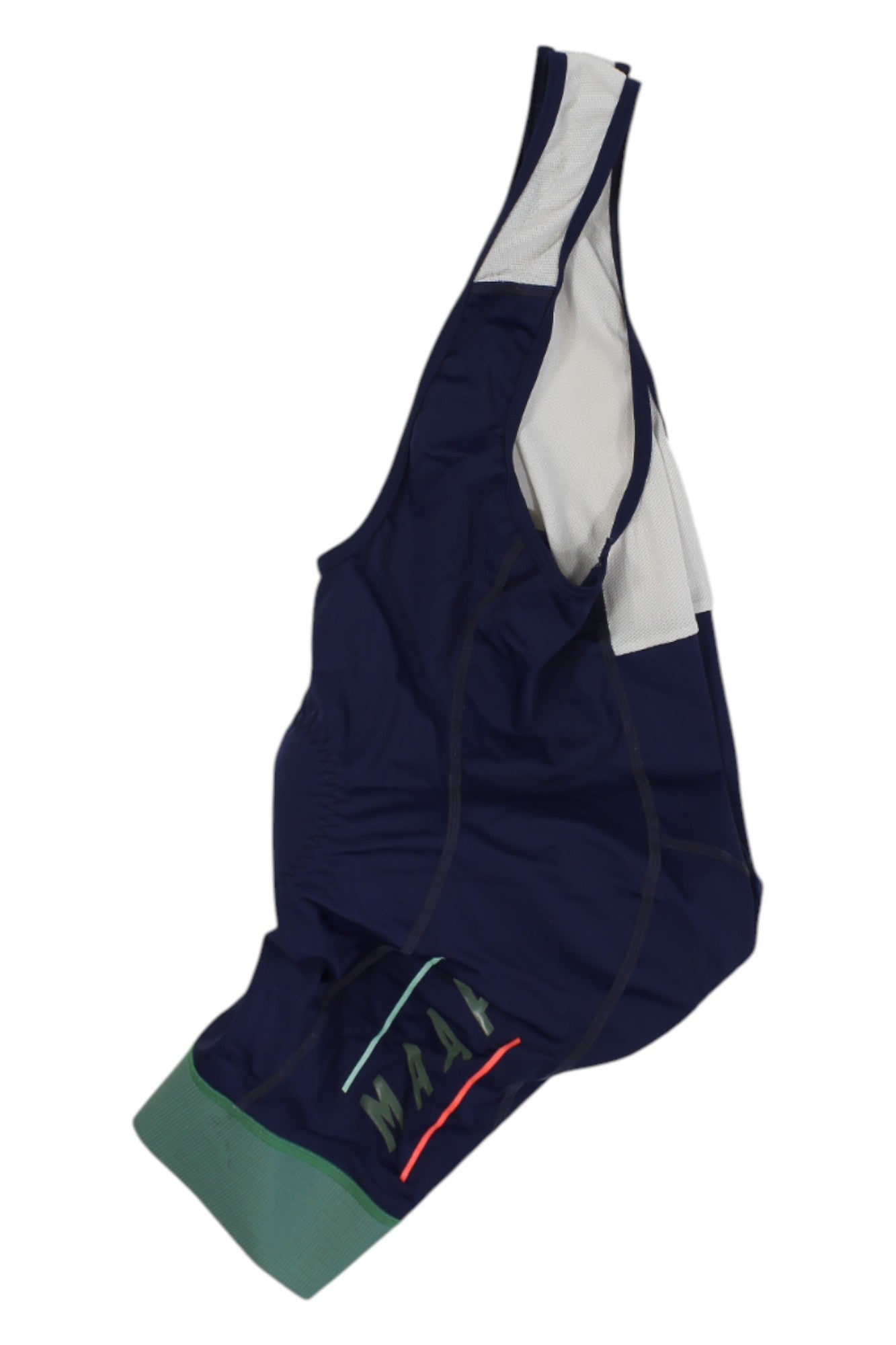 The Maap Pro Bib features navy blue and white design with green leg cuffs and "MAAP" in colorful letters near the hem. Includes chamois padding for comfort, shown laid flat on a white background.