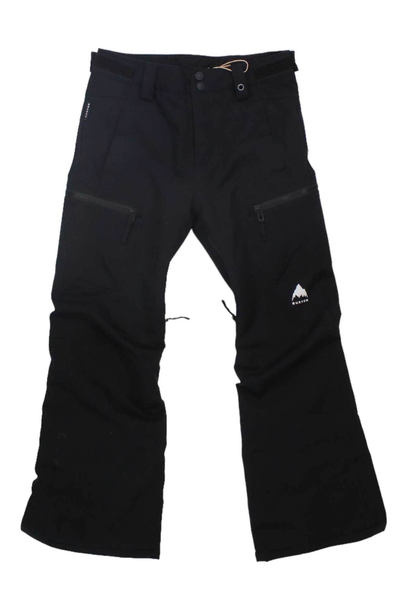 The Burton Girls Elite Cargo Pant, shown in black with insulated fabric, zippered pockets, belt loops, and a white mountain logo on the right thigh, is displayed flat on a white background. These pants are waterproof and designed for girls.