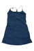 The North Face Womens EA Arque Hike Dress is a sleeveless blue hiking dress with thin straps, a straight neckline, and a flared skirt. Made from recycled polyester with moisture-wicking properties, it's shown laid flat on a white background.
