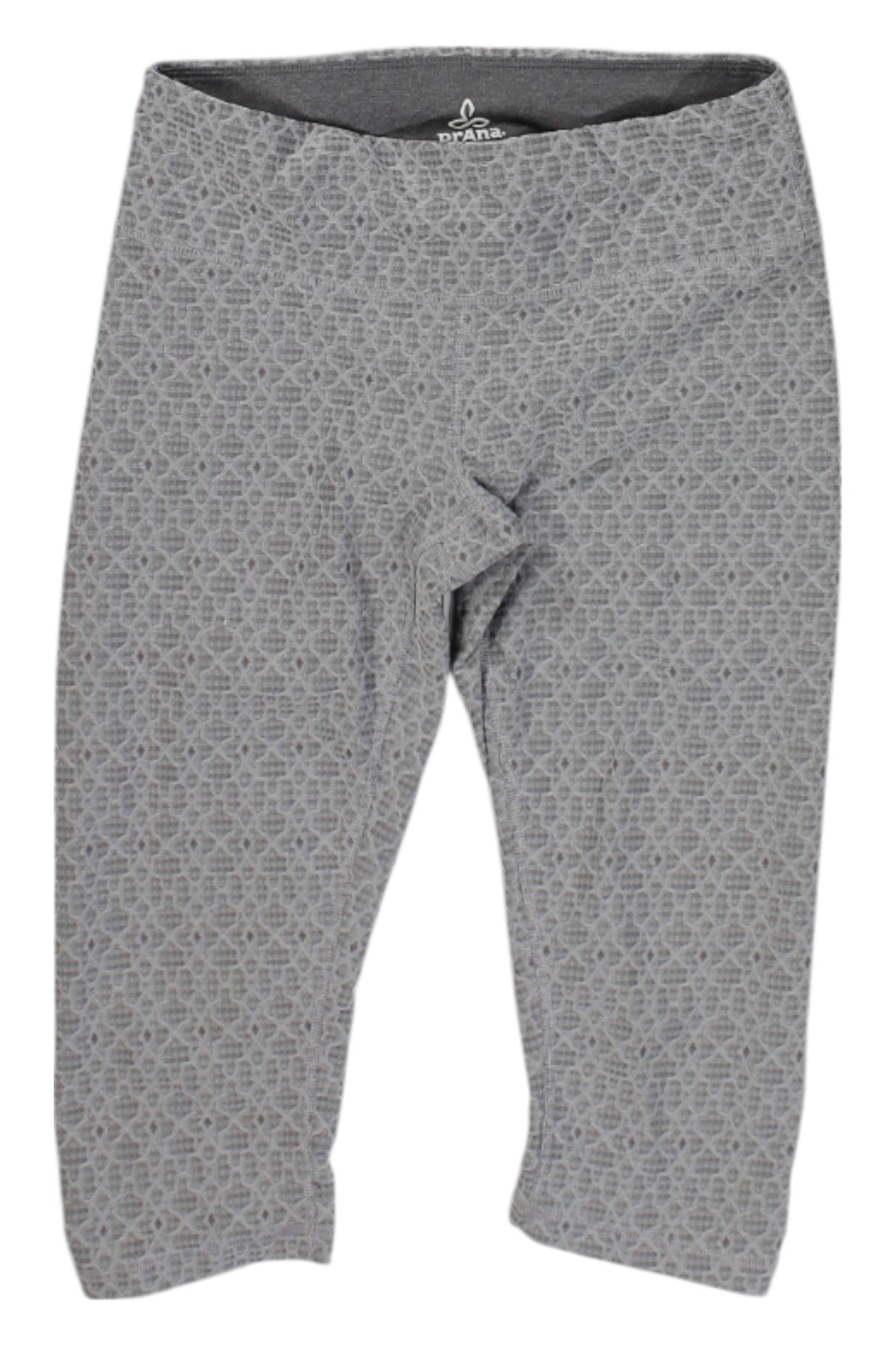 The Prana Womens Misty Knickers are gray capri leggings with a subtle geometric pattern, an elastic waistband, moisture-wicking fabric, and mid-calf length—perfect as women’s hiking leggings.
