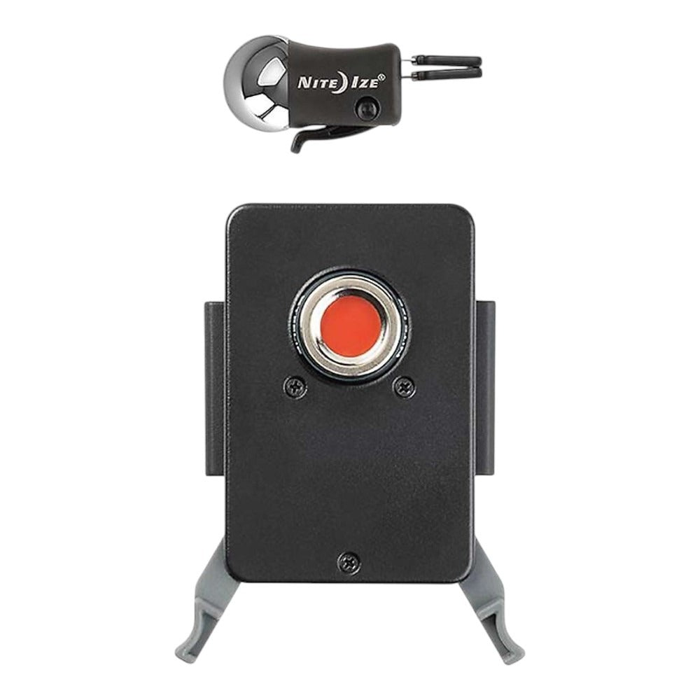 The Nite Ize Steelie Squeeze Vent Kit is a black rectangular device with a red central button, two gray foldable legs, and includes a black-and-gray tool—perfect for use as a portable speaker mount.