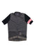 The Rapha Pro Team Training Jersey is a high-performance short-sleeve cycling top with a full front zipper, a gray body, black sleeves featuring a pink stripe on the left, and a small striped patch near the bottom hem.