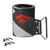 A rolled-up Black Diamond Glidelite Mix FL 135 MM Skin features a geometric black, gray, and red pattern. This mohair nylon ski skin has an attached metal tip loop and two separate small metal tail clips lying nearby.