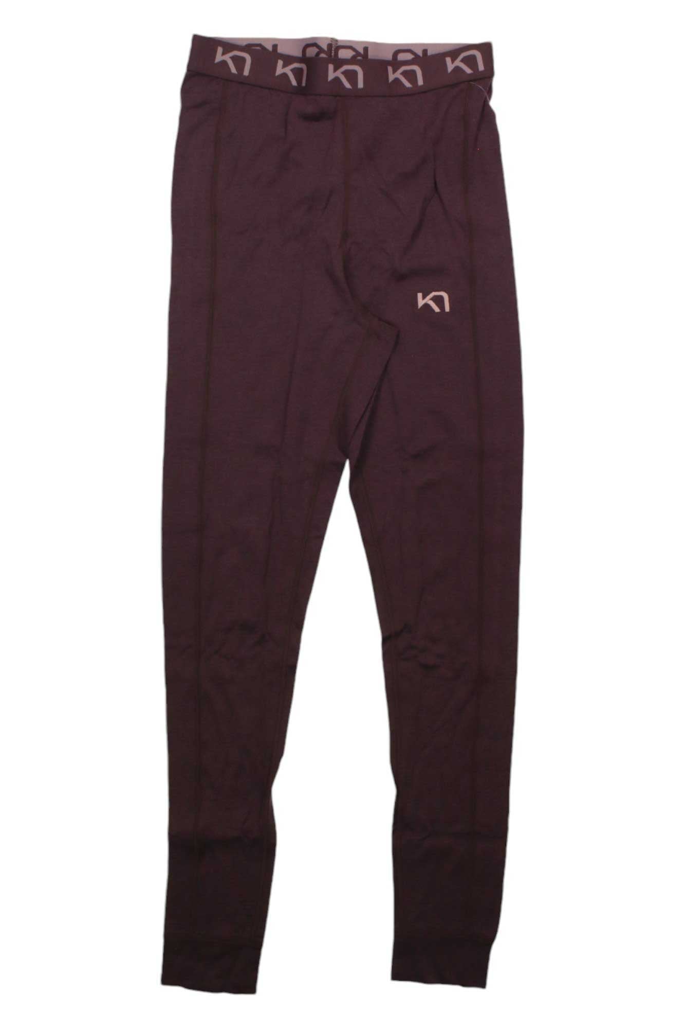 The Kari Traa Women's Klara HW Pant is a pair of maroon odor-resistant leggings with a high waistband featuring a repeating logo and a small logo on the left hip, shown laid flat on a white background.
